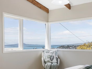 VENDOR MOVED OVERSEAS - RENOVATED WITH SEA VIEWS!