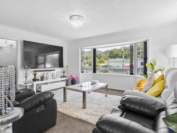 Immaculately maintained living on a corner site