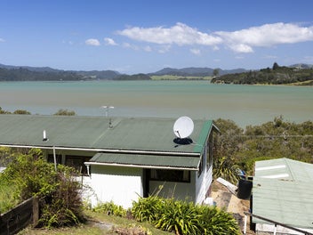 Elevated Coastal Gem with Stunning Harbour Views!