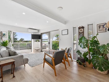 Single Level Brick Home + Sea Views