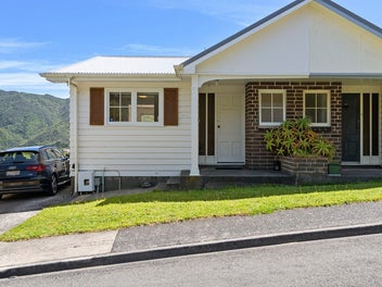 A Clever Layout with Decks, Views & All-Day Sun!