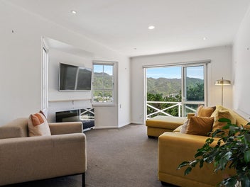 A Clever Layout with Decks, Views & All-Day Sun!