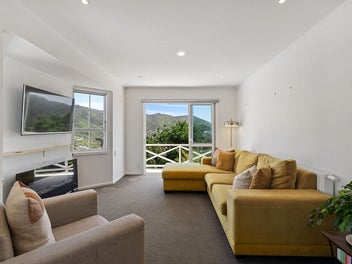 A Clever Layout with Decks, Views & All-Day Sun!