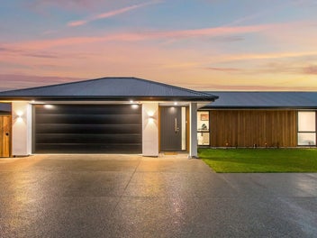 Two Homes Under One Roof!