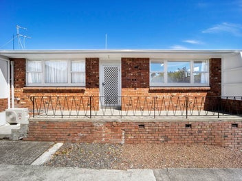 Spacious Brick Unit! Convenient Location!