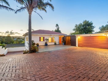 Mediterranean Vista with Ample Parking & Storage