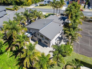 Family Living With A Gully Backdrop