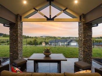 Elevated Panoramic Views With Substantial Garaging