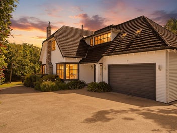 Waterfront Grandeur Meets Rural Serenity