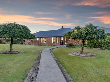 Two homes/range of outbuildings/rental income!