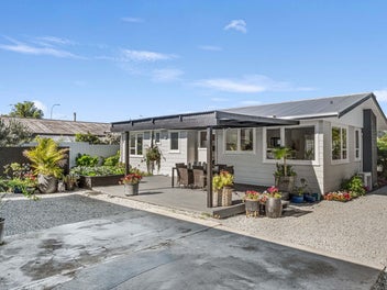 Fully Renovated, Huge Garage – This Has It All!