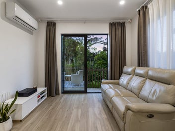 Modern Living with Privacy and Bush Backdrop