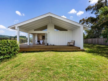 METICULOUSLY RENOVATED ON ONE ACRE OF LAND