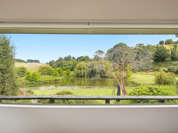 Tranquil countryside setting with captivating lake