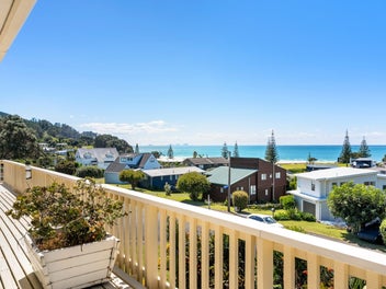 Coastal Classic with Views and Potential