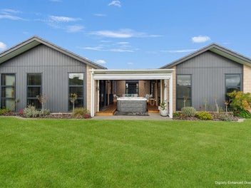 Designer Seaside Living with Impressive Garaging!