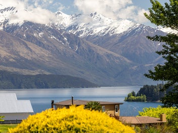 Lake Views, Chalet Charm & Walk to Town