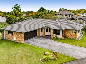 Brick single-level living in sought-after suburb