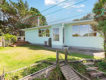 Sunny, Solid Home with Beautiful Gardens.