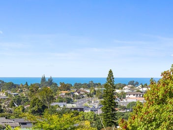 Elevated coastal living in a quiet cul-de-sac