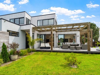 Elevated, Exceptional and just Steps to the Shore.