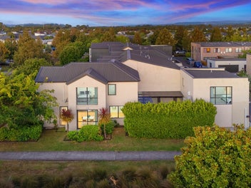 Modern 4-Bedroom Corner Home with Loft