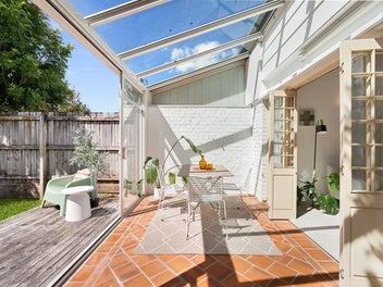 Corner Unit with Private Yard.