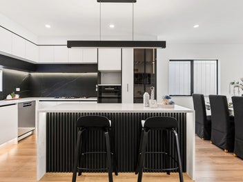 STYLISH FREEHOLD RANGI HOME WITH SEA VIEWS