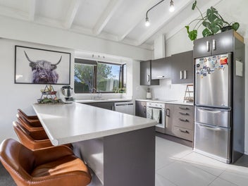 Space for family life plus a shed!