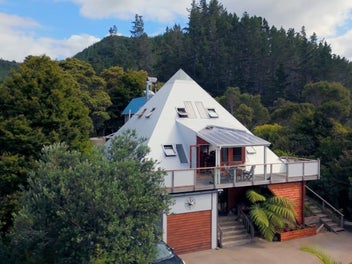 Unique Pyramid Home with river boundary
