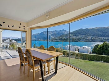 Elevated Lake and Mountain Views with Dual Access