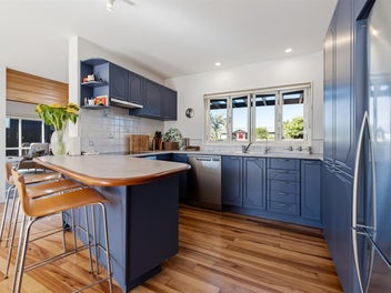 SECONDS FROM OMAHA'S WHITE SANDY BEACH