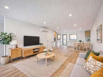 Modern townhouse is seriously priced for sale!