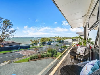 Ocean Views * Two Level Living * Walk to Beach
