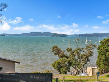 Ocean Views * Two Level Living * Walk to Beach