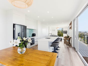 Elevated coastal living with panoramic ocean views