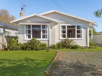 The Bungalow Home with Immediate Income!