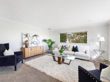 Elevated family living with room for the boat