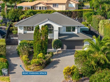 Elevated family living with room for the boat