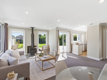 White Picket Charm Meets Modern Comfort