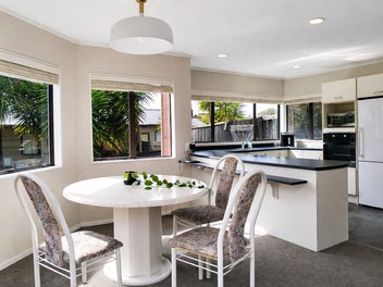 Sun-Filled Family Oasis with Future Potential