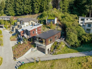 Dual-Income Alpine Retreat with Stunning Views