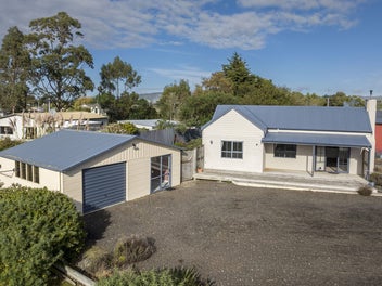 Private, sunny living with rural views