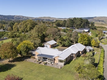 Complete lifestyle package with five car garaging!