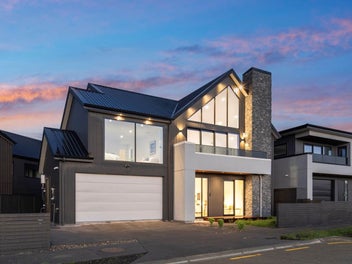 Elevated Coastal Luxury with Park and Sea Views