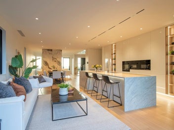 Elevated Coastal Luxury with Park and Sea Views