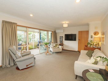 Private, Easy-Care Living with Double Garaging!