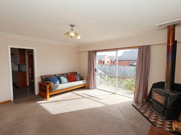 Waikiwi Treasure with Generous Garaging!