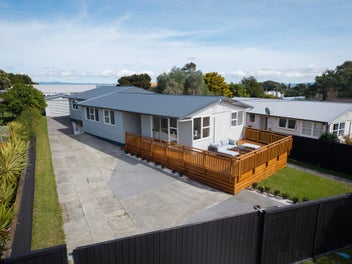 Renovated Home & Income in Prime Beach Haven