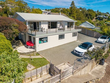 Water Views, Garaging, Workshop & Parking!